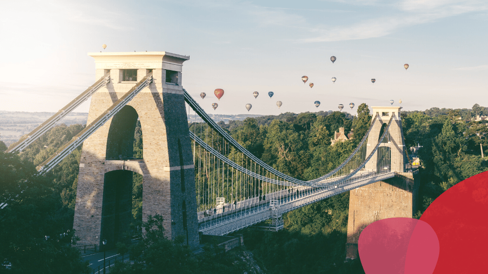 Clifton Suspension Bridge with the Bristol International Balloon Fiesta behind