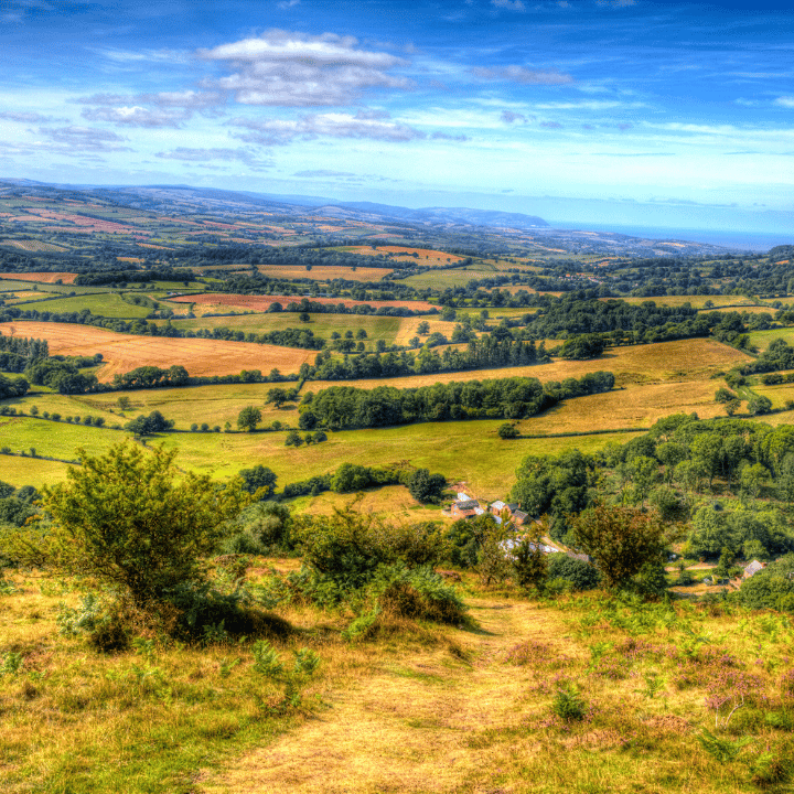 Far reaching view of the countryside across hills in Somerset