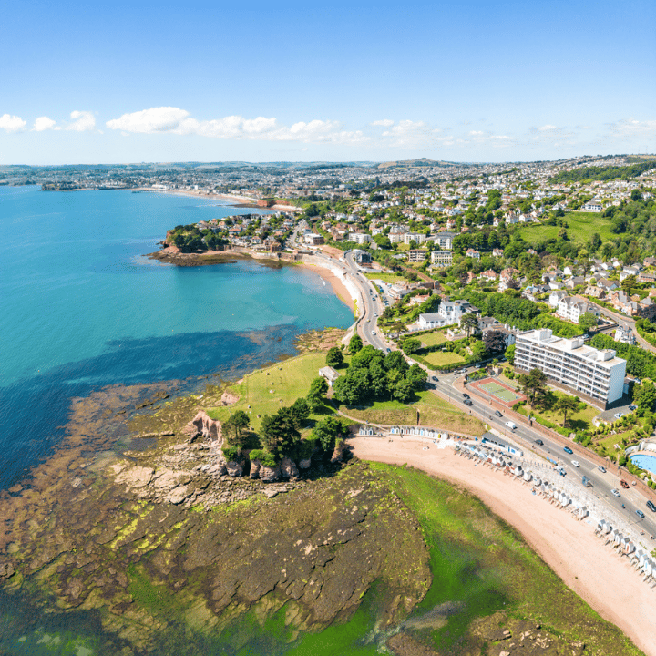 Aerial view of Torquay's buildings and beaches