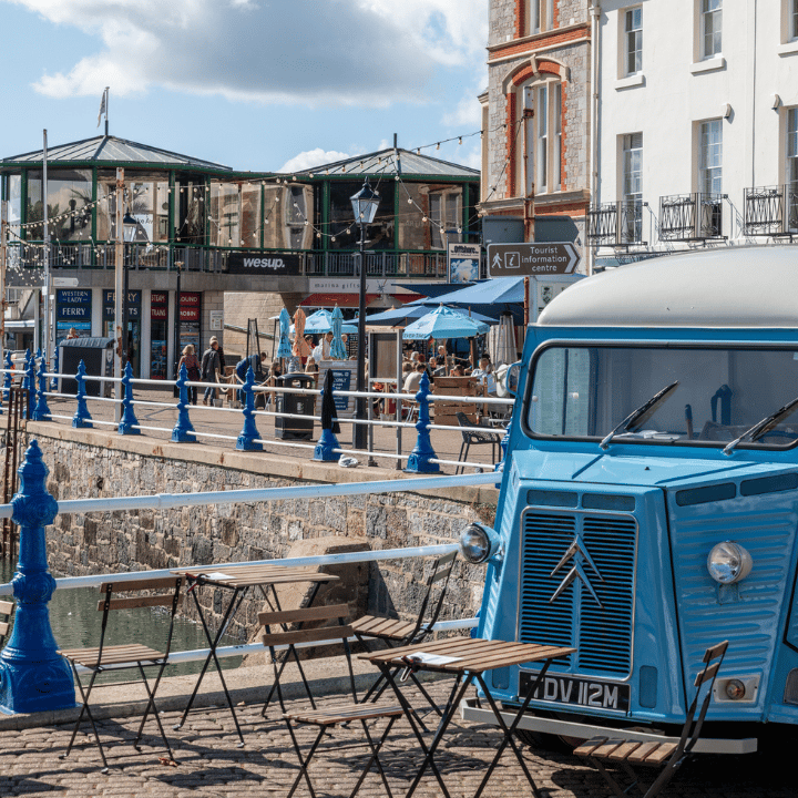 Waterfront cafes and shops in Torquay Harbour