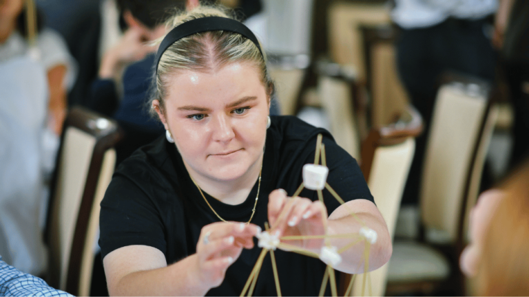 A trainee doing a team building exercise.