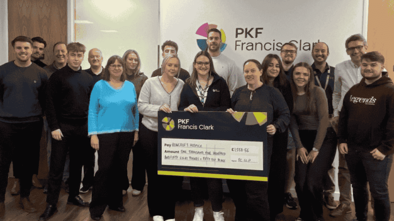 Torquay team at a charity cheque presentation