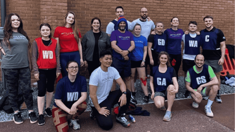 Torquay team play netball against Wollen's solicitors team
